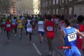 Deelnemers lopen door de straten van Kopenhagen tijdens een WK wegatletiek